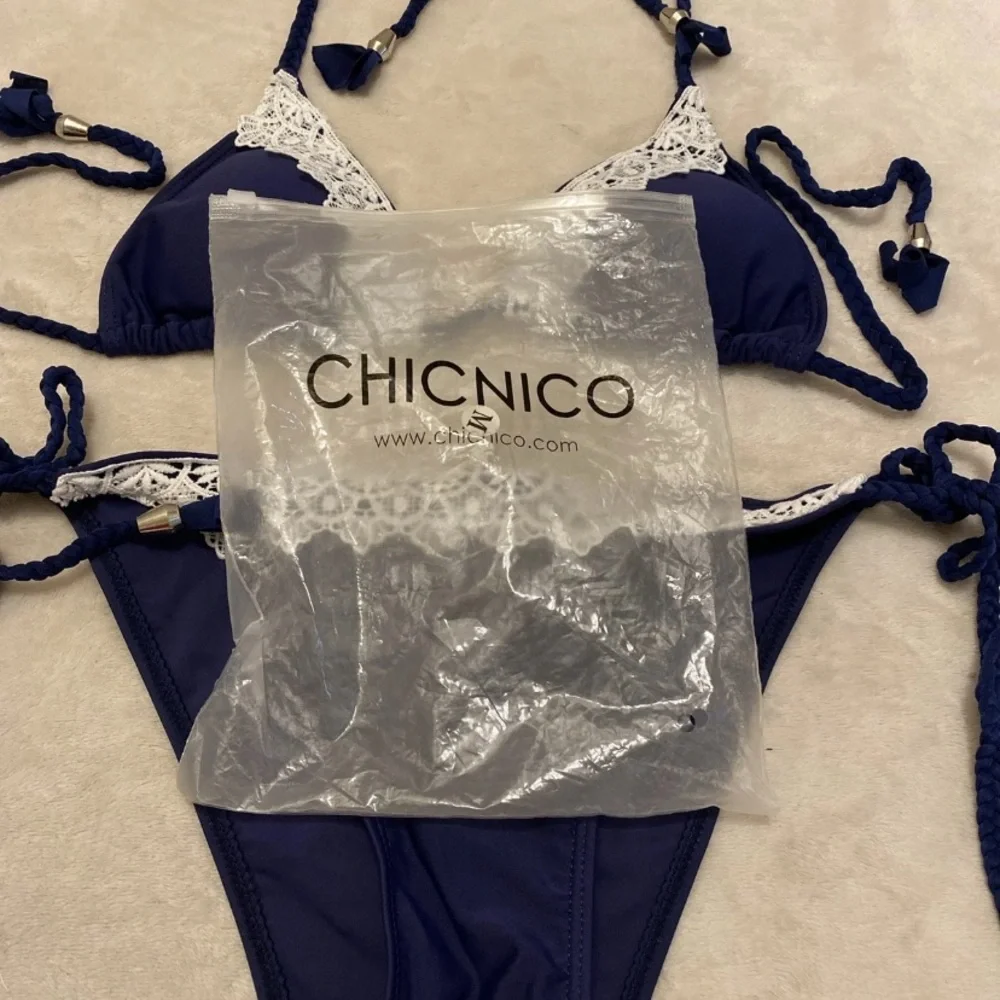 Elegant Navy Bikini with White Lace Trim